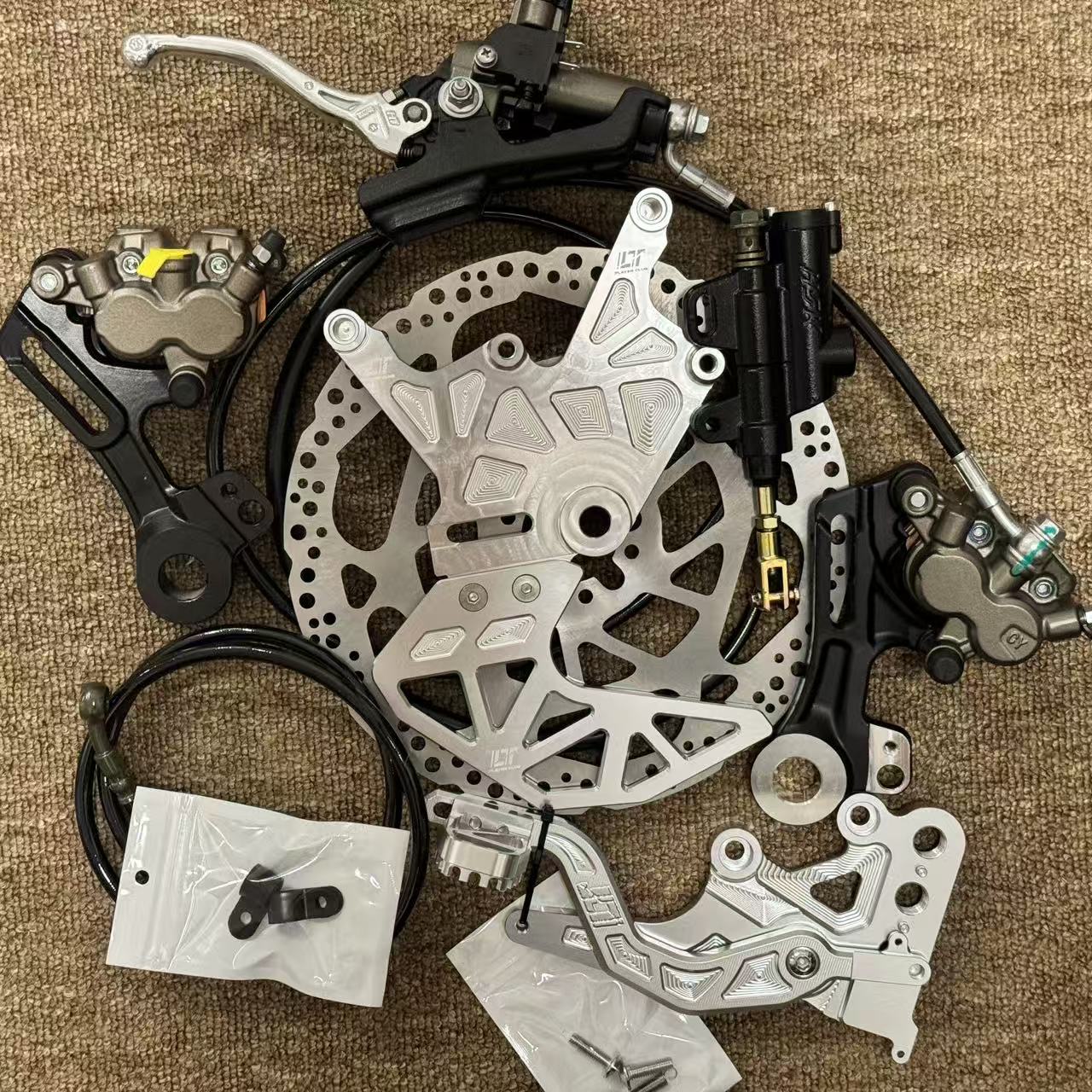 طقم حامل مزدوج للمكابح الخلفية - مراجعة Brake Caliper وسعره